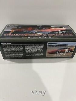 AUTOGRAPHED Buddy Baker's #6 1969 Dodge Charger Daytona University of Racing