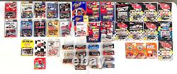 Lot of 47 NOS 164 scale race cars, several drivers, carded &boxed, EVC