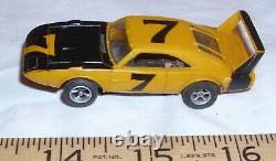 AURORA AFX #7 DODGE DAYTONA SUPERBIRD VOITURE DE COURSE HO SLOT CAR DES ANNÉES 1970 EN JAUNE BEAU