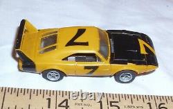 AURORA AFX #7 DODGE DAYTONA SUPERBIRD VOITURE DE COURSE HO SLOT CAR DES ANNÉES 1970 EN JAUNE BEAU